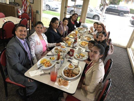 Having breakfast with teenagers right before their Transformational Teen Leadership program.