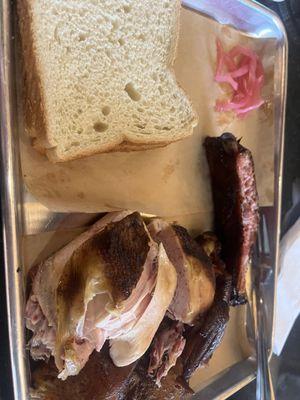 1/2 chicken served with 2 pieces of white bread! Perfection