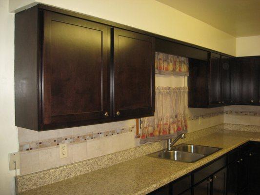 Cabinet refinishing; Countertop installation