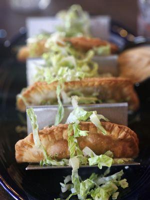 Empanadas w/ a delicious sauce on the side