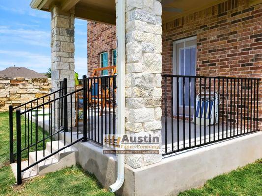 black metal porch fence