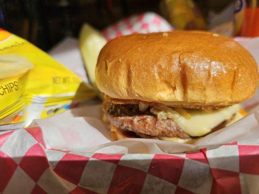 Dee Burger, with baby Swiss cheese, sautéed onions, French fried onion strings, and barbecue sauce on a toasted bun.