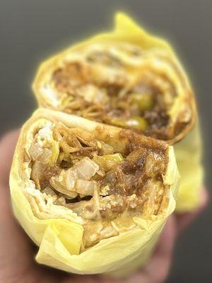 Breakfast Burrito: Two eggs, cheese, sausage, hash browns, chili & flour tortilla + grilled onions + grilled yellow peppers | $9.85