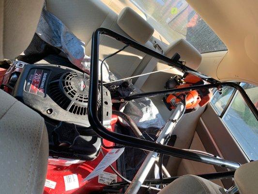 Our happy lawn mower and weed whacker on their way home :)