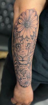 Lioness and cub done by Aaron