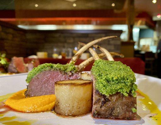 Roasted rack of lamb carrot and pickled Serrano mouseline fondant potato and herb Demi glacé