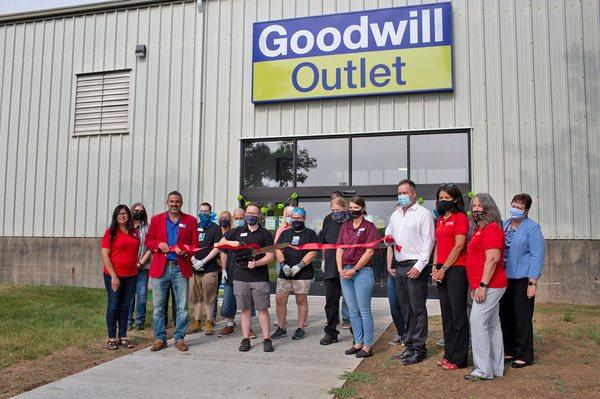 Ribbon cut for the Outlet Store's Grand Opening.