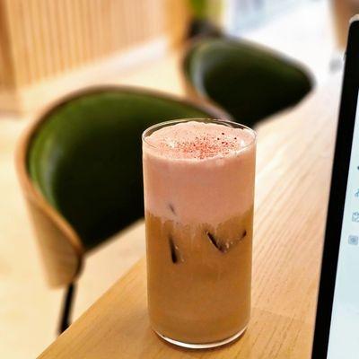 Latte with strawberry foam