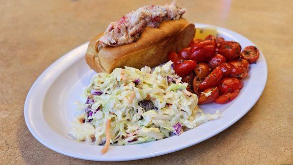 Lobster Roll with balsamic tomatoes and coleslaw