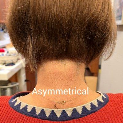 Asked to trim to middle of neck, but this is like a boy cut and sides were extremely asymmetrical.
