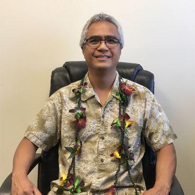 Dr Christopher Tokin