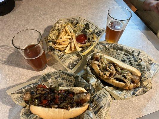 Two of Sami's saison beers with a carnival bratwurst (left) and an Appalachian bratwurst (right). Chefs kiss*