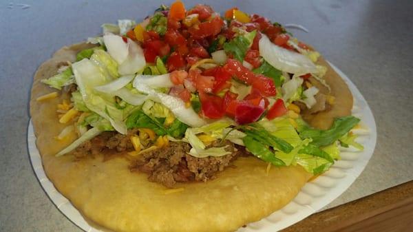 Indian taco. Traditional fry bread, beans, ground beef, cheese, lettuce, tomatoes, onion, and salsa. Made to order