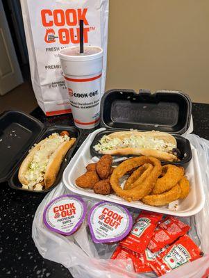 2 Dog Tray. Both hot dogs Cook Out Style (chili, slaw, mustard, onion). Sides: Onion rings and hush puppies. $9.37 before tax. $10.20 after.