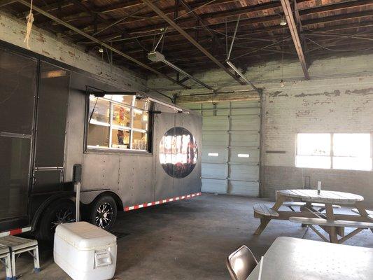 The warehouse and the food trailer