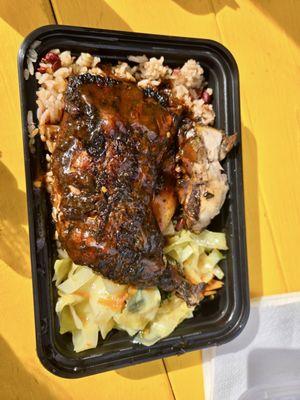 Jerk Chicken with Plantains, Cabbage, and Rice and Peas.