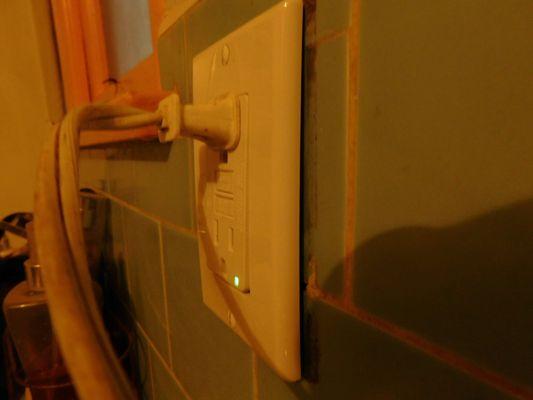 Gap in repaired electrical socket @ 3010 Highview, Altadena