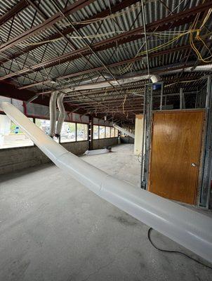 Commercial job. This is an example of negative air pressure and contaminants being extracted outside.