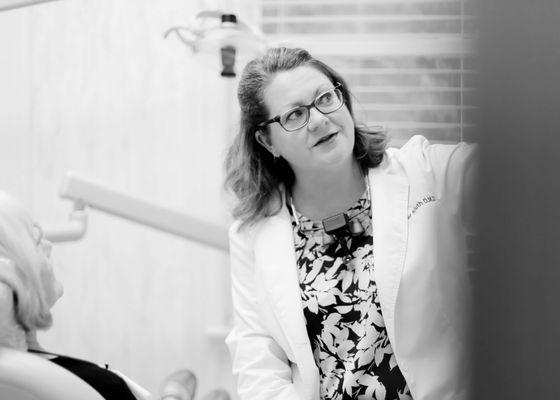 Dr. Jennifer Kluth discussing a treatment plan with a patient.