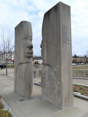 Each of the blocks has two face halves representing world races