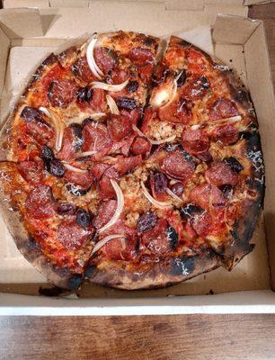 Tiny burnt Polly Pocket pizza