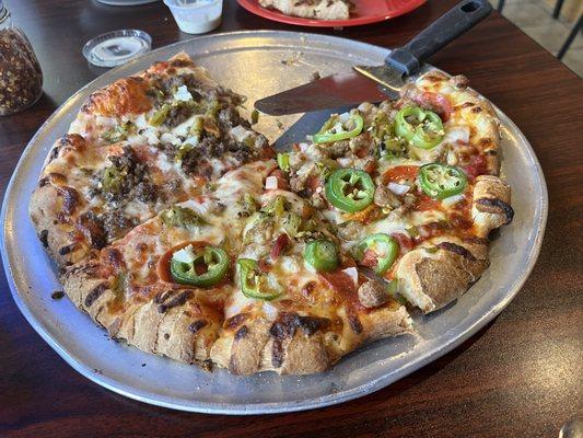 Small pizza 1/2&1/2 about $16.50 SO good!