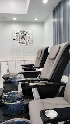 Relax on the adjustable massage chair while getting a pedi and massage