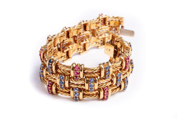 Beautiful 18kt vintage bracelet with 6cts of sapphires and rubies.