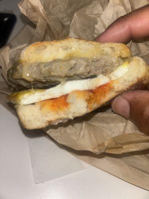 Sunrise sausage melt Baked egg, sausage patty & red pepper aioli on English muffin