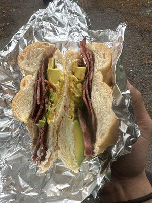 A one egg $12 avo blt that's missing the lettuce and tomato