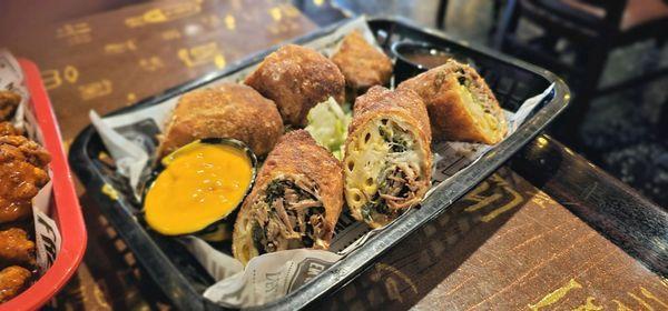 IG: tonylameats |Dirty South Rolls (3) Braised Ox-tails, Collard Greens, Mac And Cheese, Stuffed in egg rolls, served w/ gravy au jus