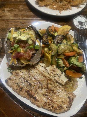 Grilled chicken, loaded baked potato and mixed veggies