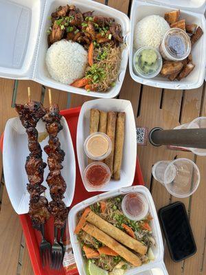 Pancit, Lechon, chicken Adobo, and pork skewers (aka Filipino BBQ)