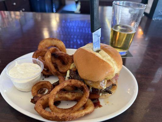 Rodeo burger with onion rings and ranch.
