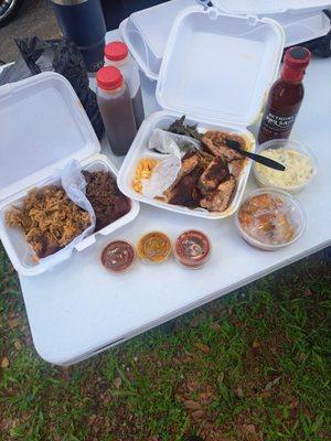 Pulled pork, brisket, collard greens, mac n cheese, ribs, beans, potato salad, peach cobbler, 3 different sauces and pineapple tea!