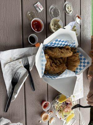 Fish + Chips Sampler (less the two pieces we already ate!) + fresh shrimp cocktail. Delish!