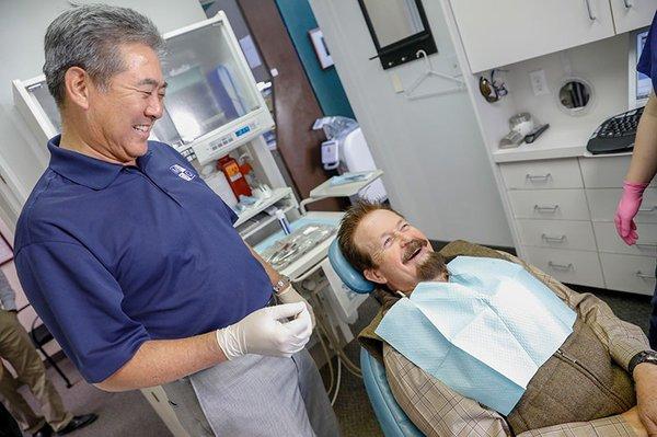 Dr. Ikemiya speaks with a patient