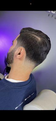 Classic Modern Haircut - light taper on the side and skin taper on the back.