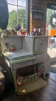 Nice looking antique stove/oven at the entrance of the Café.
