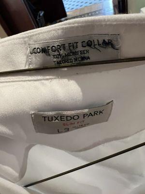 Super worn, frayed, button falling out, too small suit shirt.