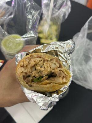 Carnitas burrito (rice onions cilantro beans)