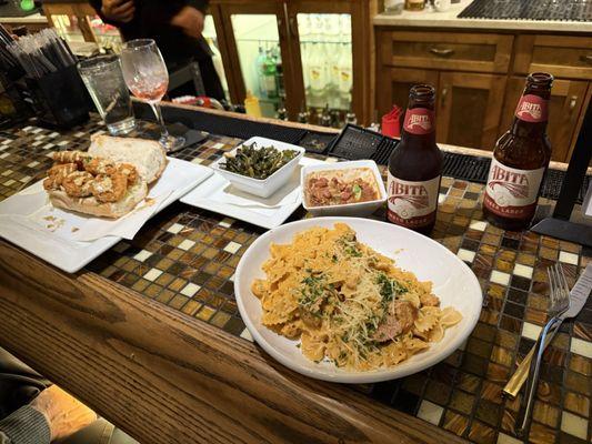 Shrimp po-boy and Cajun Alfredo,