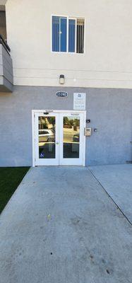 Full Exterior Renovation on Multifamily Building in North Hollywood. Including Paint, Stamped Concrete, and Synthetic Turf Installation.