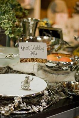 lifestyle shot of michael aram pieces. front and left is a cake plateau