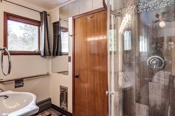 Cedars bath, custom barnwood tile shower. Fun and unique.