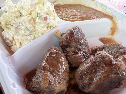 Jamaican Jerk Pork Wings with potato salad and baked beans