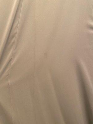 Stained/burned from press/steam