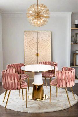 Round dining set for 4 with rose dining chairs.