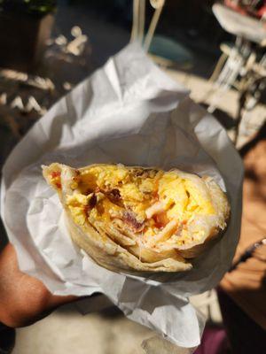 Bacon and cheese breakfast burrito