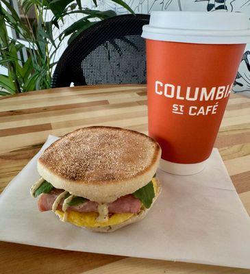 Hot Latte with our I-L-L-HAM breakfast sandwich made with egg, smoked ham, gouda cheese